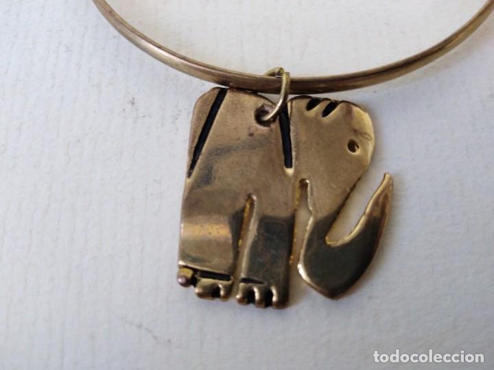 Joyeria: 3 pulseras doradas con colgantes - Foto 2