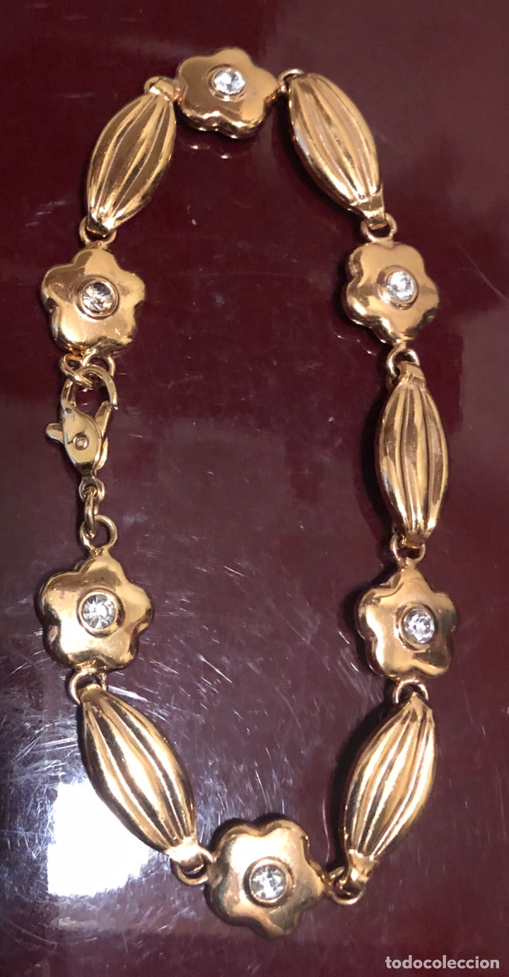 Joyeria: Bonita pulsera chapada en oro, con piedrecitas tipo brillantes