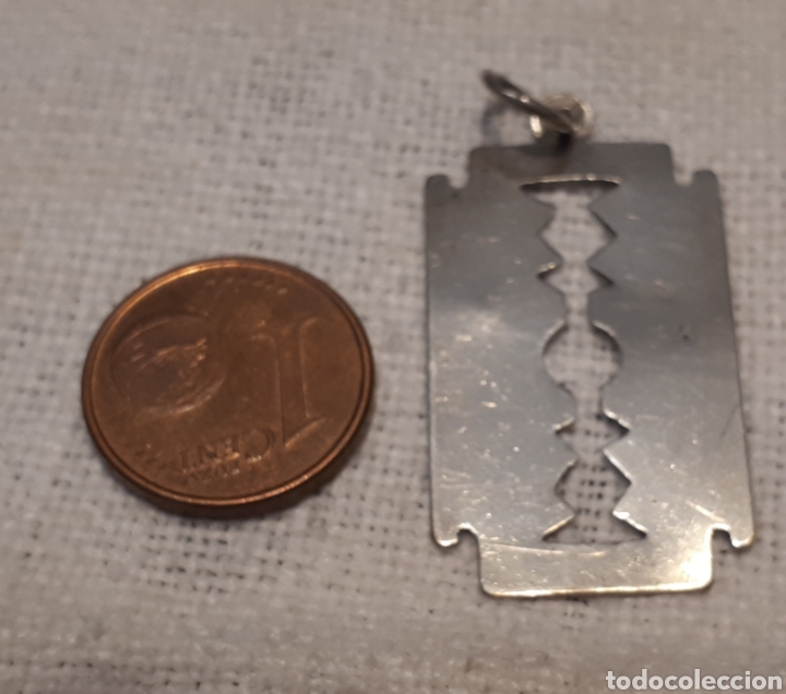 Joalharia: Colgante vintage hoja afeitar plata?