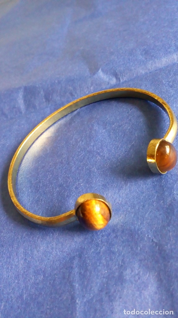 Joaillerie: PULSERA DORADA CON DOS CABUJONES DE OJO DE TIGRE