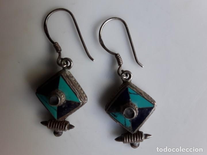 Gioielleria: Pendientes de plata y esmalte. Con contraste