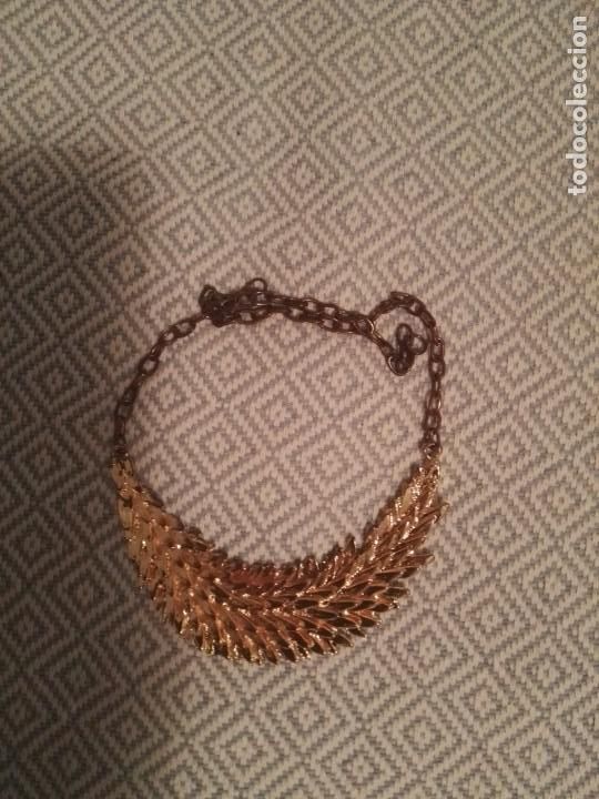 Joaillerie: Gargantilla met&aacute;lica dorada