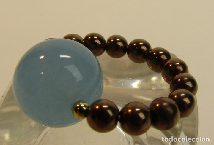 Joyeria: ANILLO EL&Aacute;STICO CON BOLAS LISAS EN AZUL Y BRONCE - Foto 2