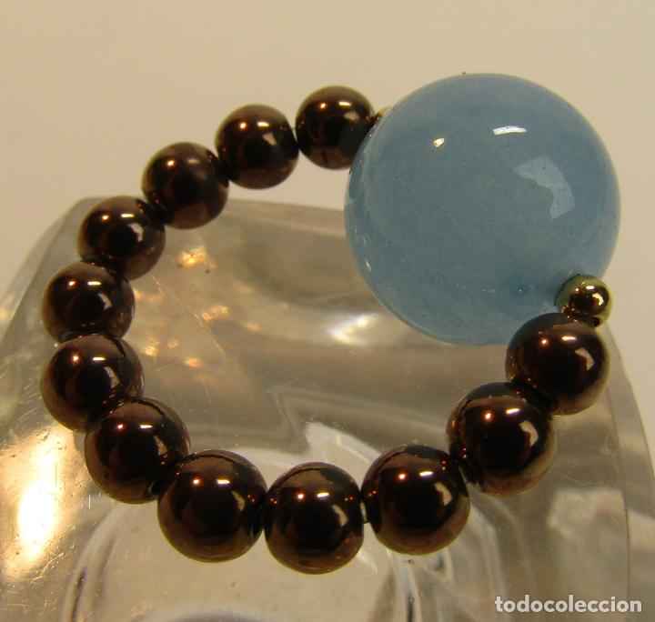 Joyeria: ANILLO EL&Aacute;STICO CON BOLAS LISAS EN AZUL Y BRONCE - Foto 3