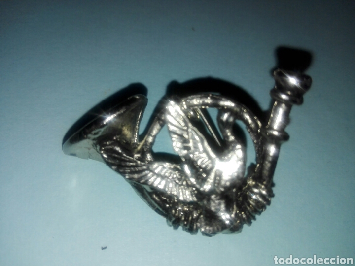 Joaillerie: Broche trompa con p&aacute;jaro plateado - A&ntilde;os 90