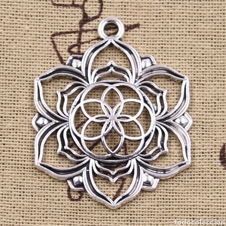 Joyeria: (NM.01) COLGANTE COLOR PLATEADO. FLOR DE LA VIDA. - Foto 1