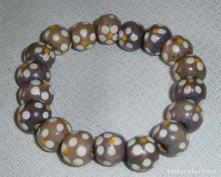 Joalharia: pulsera regulable con flores pintadas