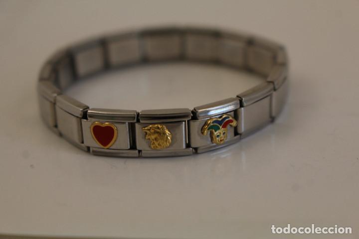 Joyeria: pulsera de acero y chapada en oro corazon arlequin y buho