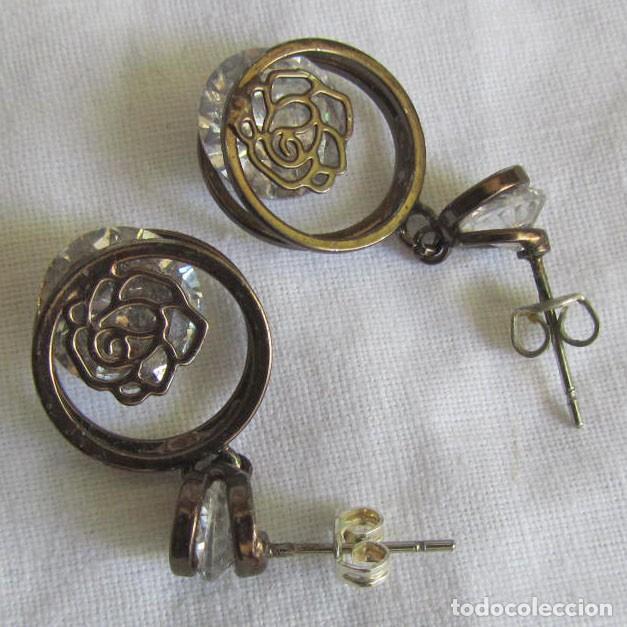 Joaillerie: Pendientes met&aacute;licos con circonitas giratorias