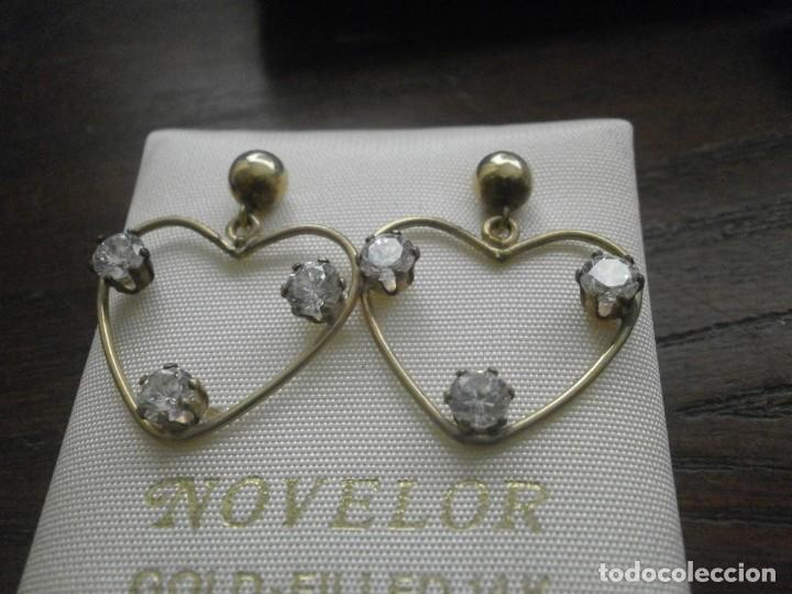 Joaillerie: Pendientes corazon con 3 piedrecitas Gold Filled 14 k 3 cm.