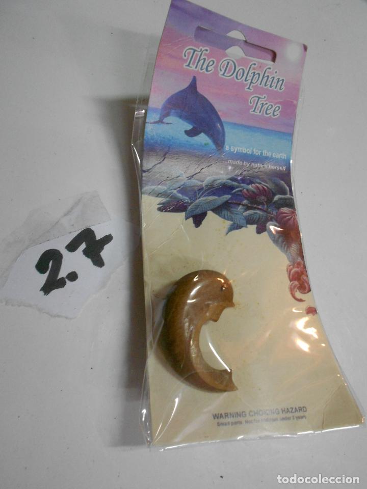 Joaillerie: ANTIGUO COLGANTE CON SEMILLA DEL ARBOL DE LOS DELFINES HURA CREPITANS EN SU BLISTER NUEVO SIN USAR -