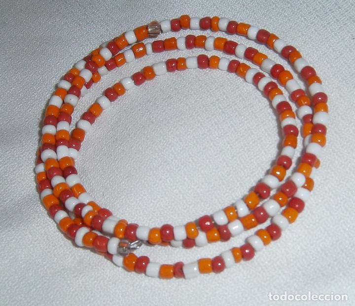 Schmuck: pulsera extensible cuatro vueltas piedras blancas naranjas y rojas