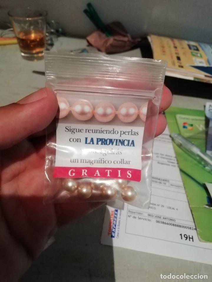 Joaillerie: Bolsa llena de perlas de fantas&iacute;a promoci&oacute;n La Provincia Diario de Las Palmas