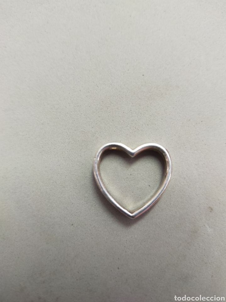 Joyeria: COLGANTE DE METAL PLATEADO EN FORMA DE CORAZON - Foto 1