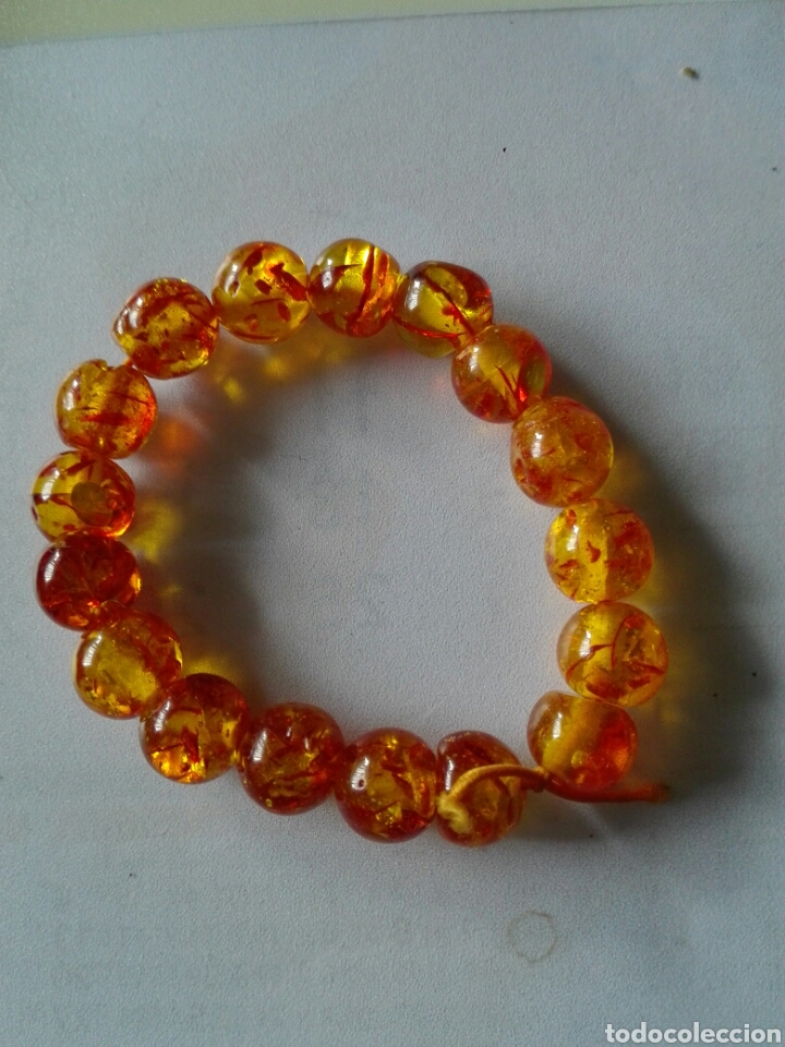 Joyeria: PULSERA ABALORIOS COLOR AMBAR.PLASTICO. EXTENSIBLE