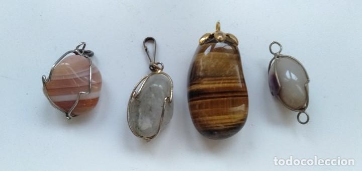 Schmuck: Conjunto de cuatro colgantes, el grande de ojo de tigre