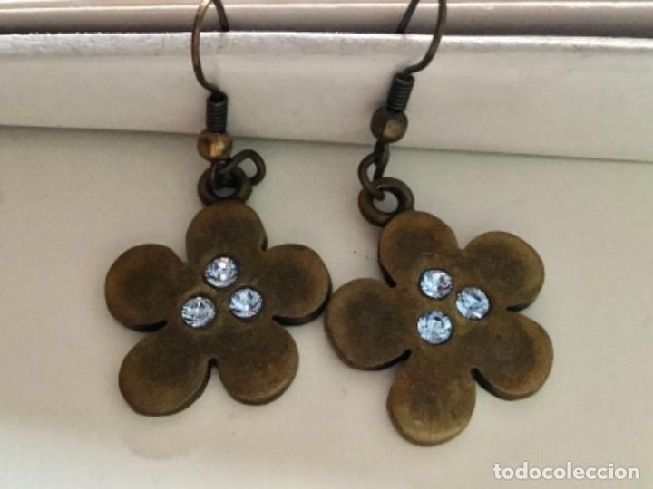 Joyeria: PENDIENTES DE FLOR. BA&Ntilde;O DE BRONCE Y CRISTAL AZUL - Foto 1
