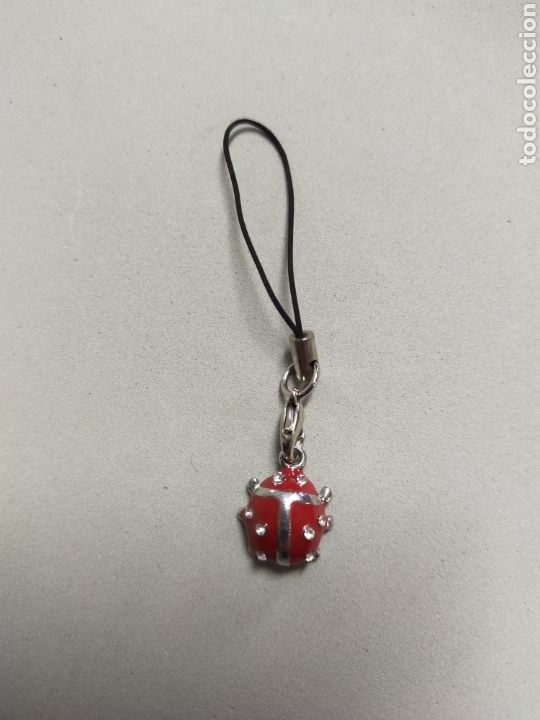 Joalharia: COLGANTE DE MARIQUITA EN METAL Y ESMALTE.