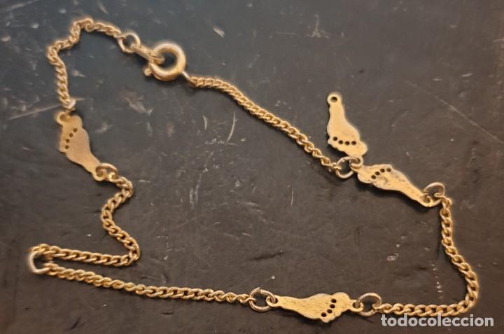 Joyeria: Pulsera dorada con pies - Foto 1