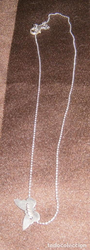 Joyeria: cadena plateada con una mariposa - Foto 1
