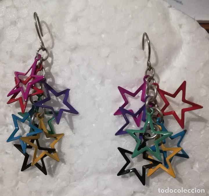 Joyeria: PENDIENTES CON ELEMENTOS EN FORMA DE ESTRELLA