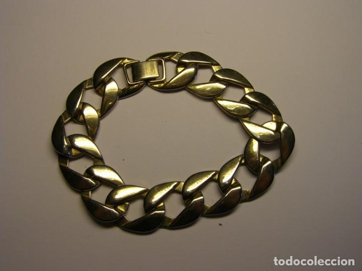 Joalharia: pulsera de bisuteria, color dorado. A&ntilde;os 70.