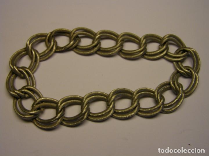 Joalharia: pulsera de bisuteria, color plateado. A&ntilde;os 70.