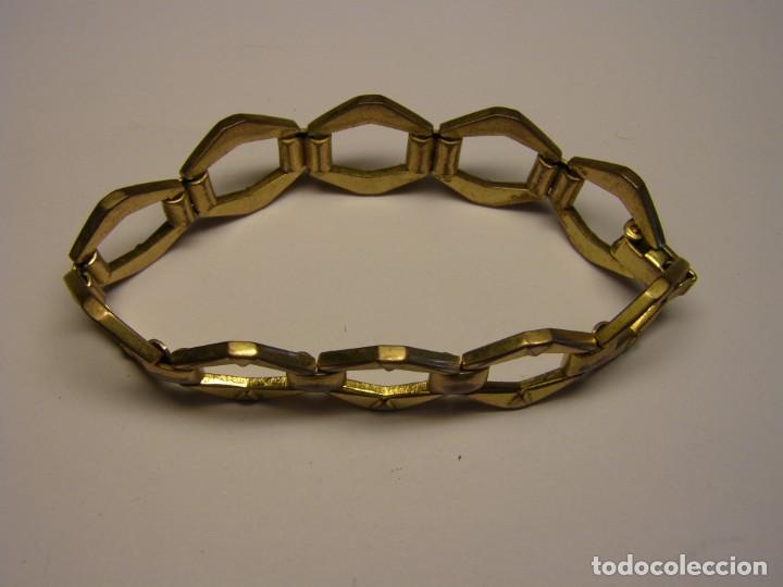 Joalharia: Pulsera de bisuter&iacute;a, color dorado. A&ntilde;os 70.