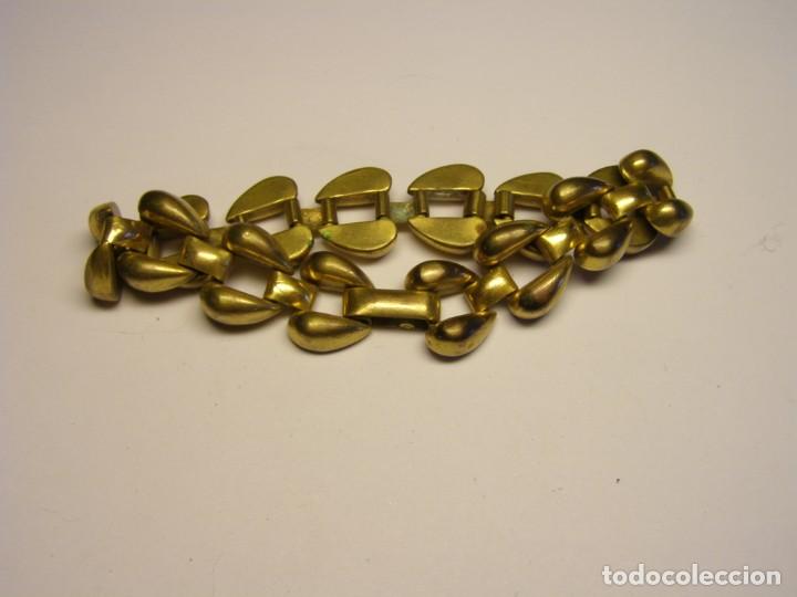 Joalharia: Pulsera de bisuter&iacute;a, color dorado. A&ntilde;os 70.