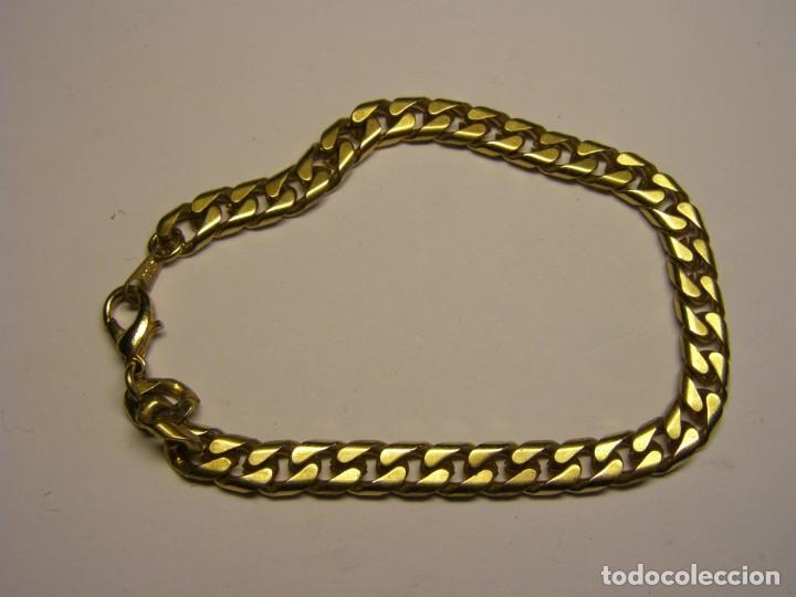 Joalharia: Pulsera de bisuter&iacute;a, color dorado. A&ntilde;os 70.