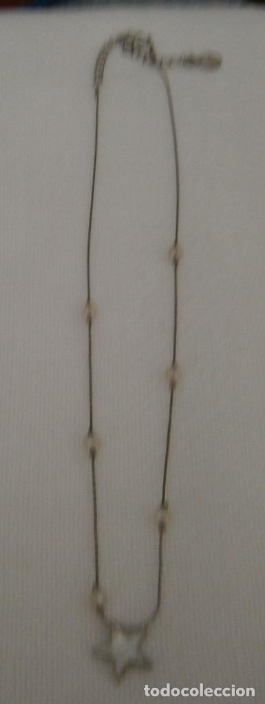 Gioielleria: colgante cadena plateada con estrella piedrecitas peque&ntilde;as