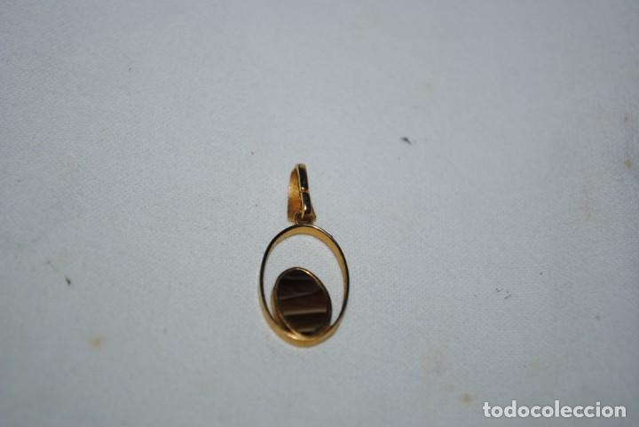 Joalharia: COLGANTE CON PIEDRA OJO DE TIGRE .