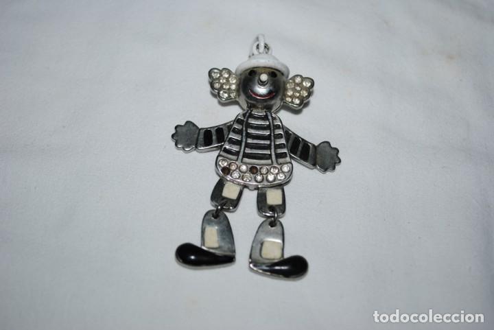 Joalharia: COLGANTE EN FORMA DE PAYASO ARTICULADO