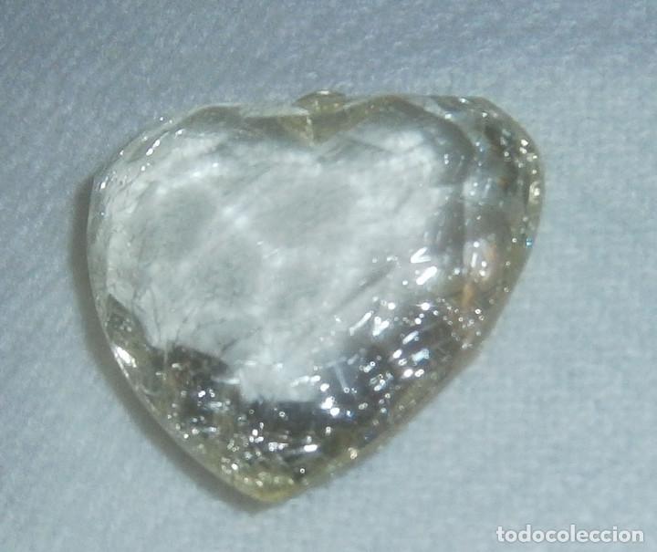 Gioielleria: colgante en forma de corazon parecido a cristal