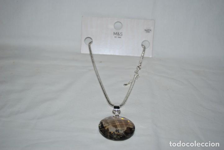Joaillerie: COLGANTE PLATEADO CON CRISTAL FACETADO .