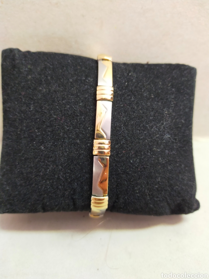 Joaillerie: PULSERA DE METAL PLATEADO Y DORADO, 19 CM.
