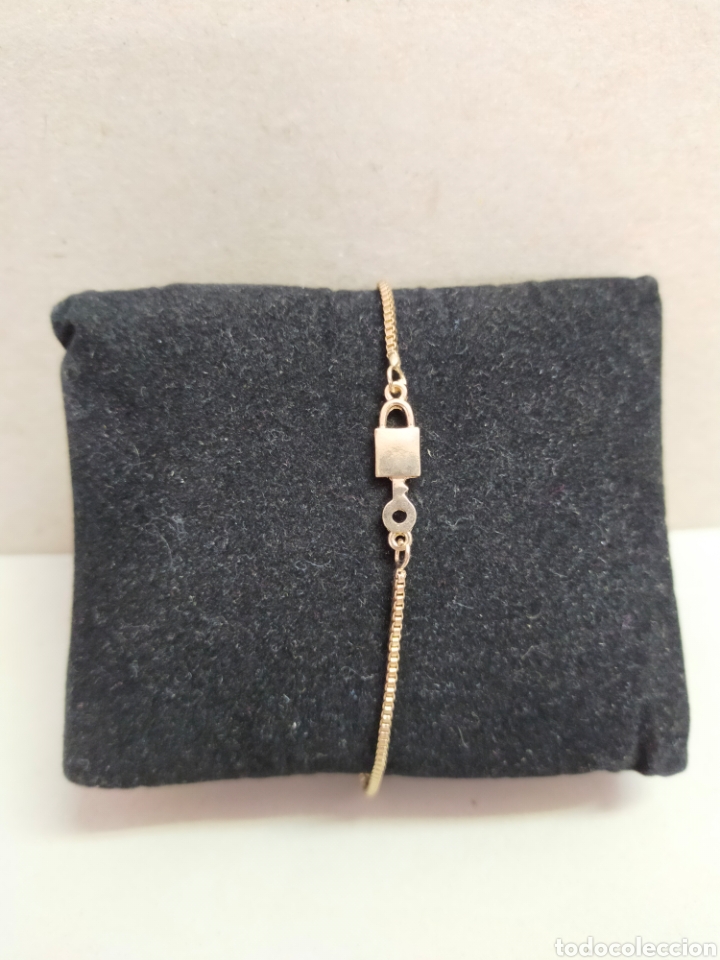 Joyeria: PULSERA CON CANDADO EN METAL DORADO. - Foto 1