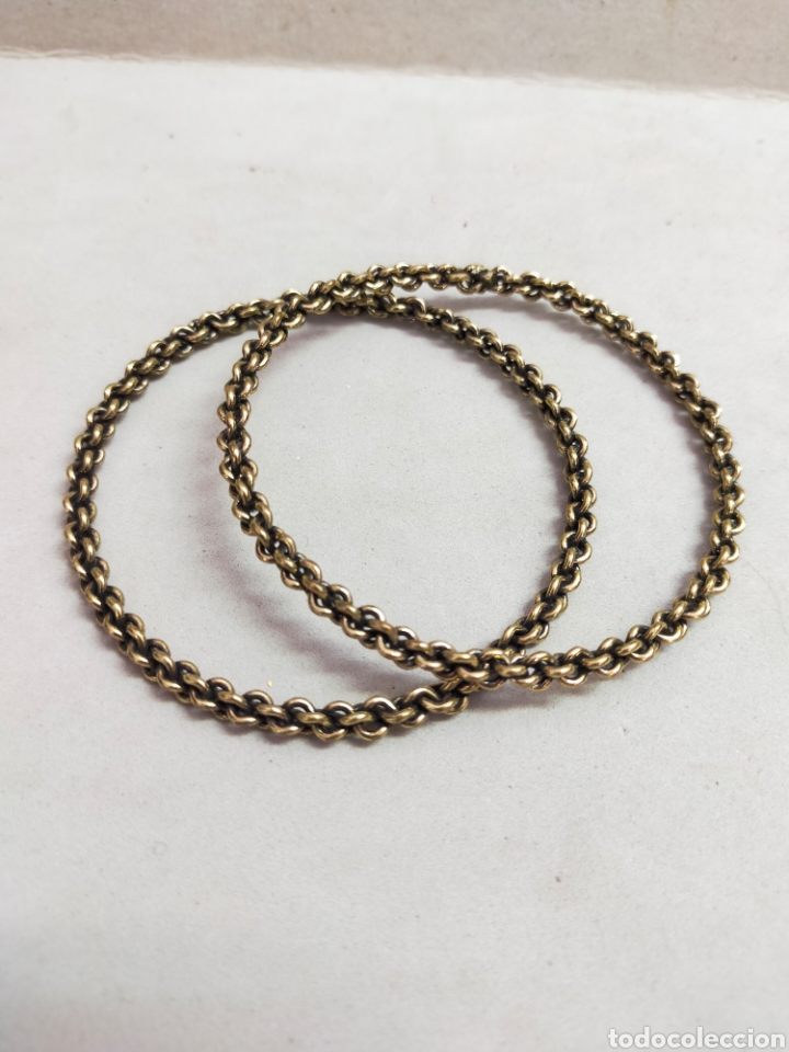 Joalharia: PAREJA PULSERAS RIGIDAS EN METAL DORADO.