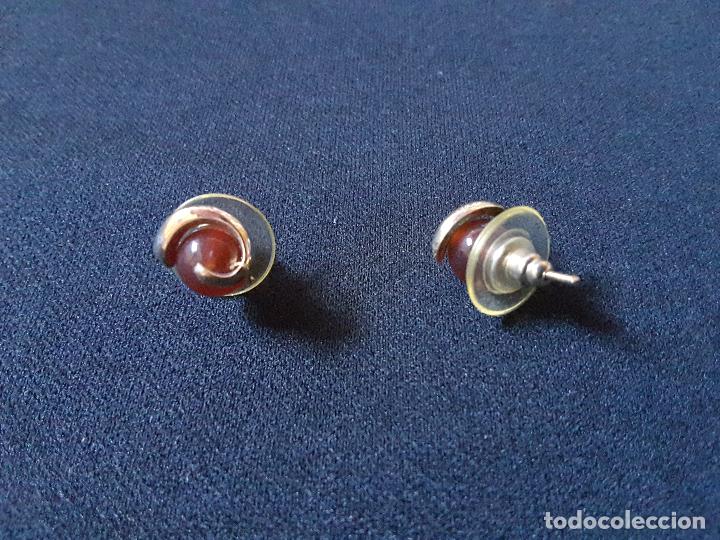 Joalharia: Pendientes &aacute;gata roja.