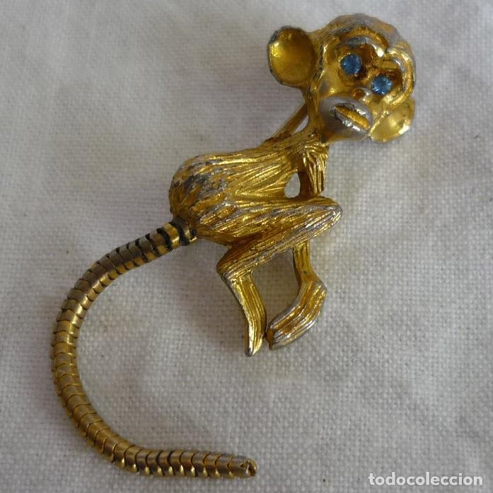 Gioielleria: Simp&aacute;tico broche met&aacute;lico en forma de mono