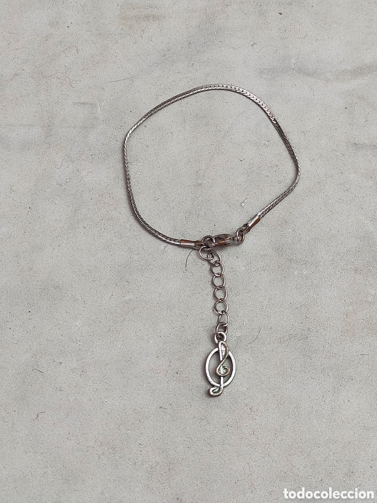 Joyeria: PULSERA CON CLAVE DE SOL EN METAL - Foto 1