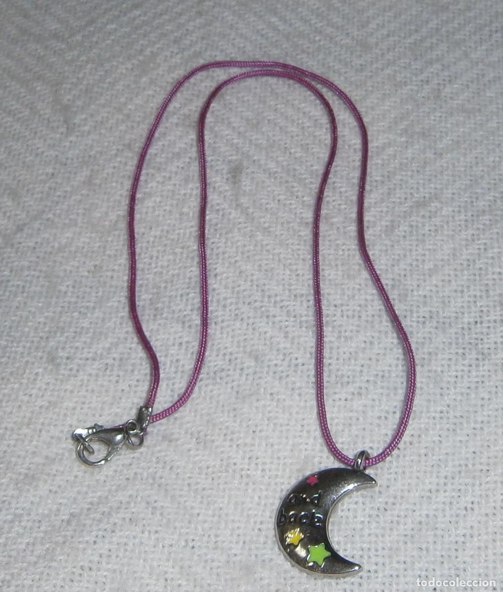 Gioielleria: colgante en forma de luna con un escrito en ingles (he vuelto)