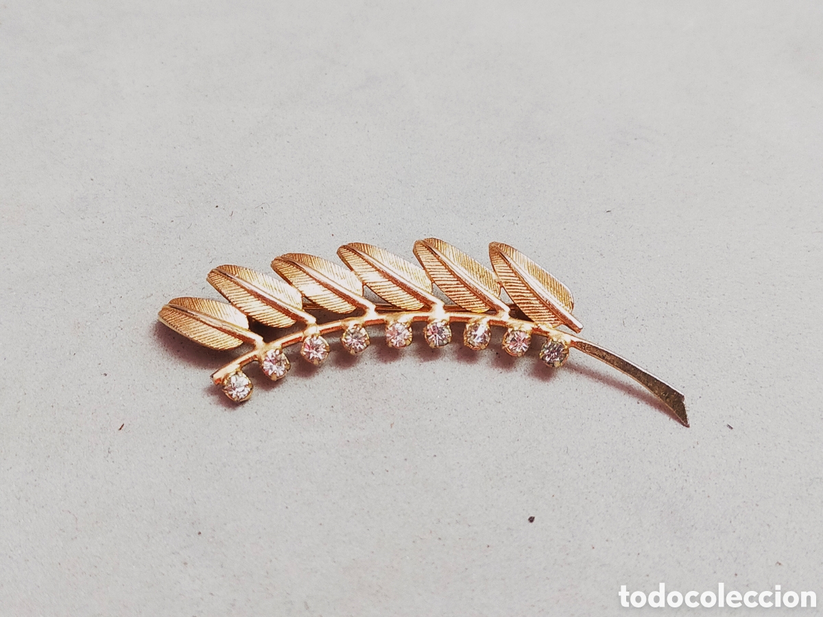 Joaillerie: BROCHE DE BISUTERIA EN METAL DORADO Y CRISTALES TALLADOS.