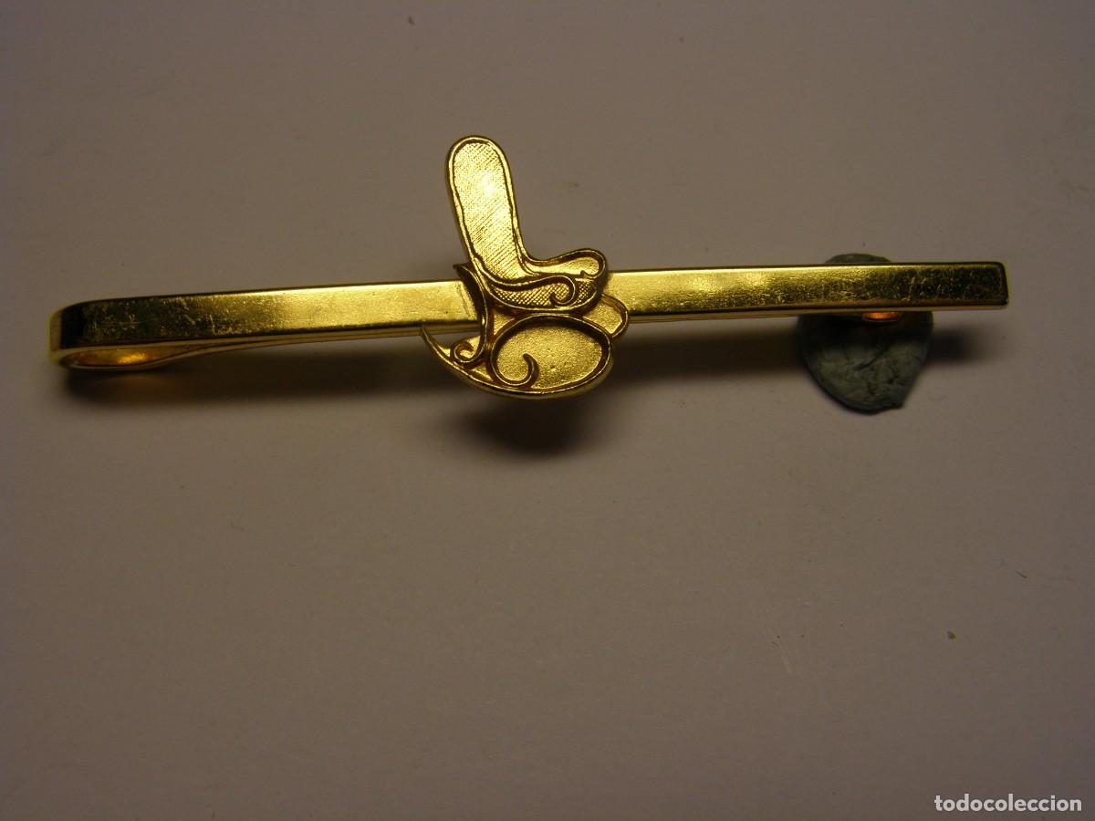 Gioielleria: Pisacorbatas o pasacoprbatas con una tumbona valenciana.