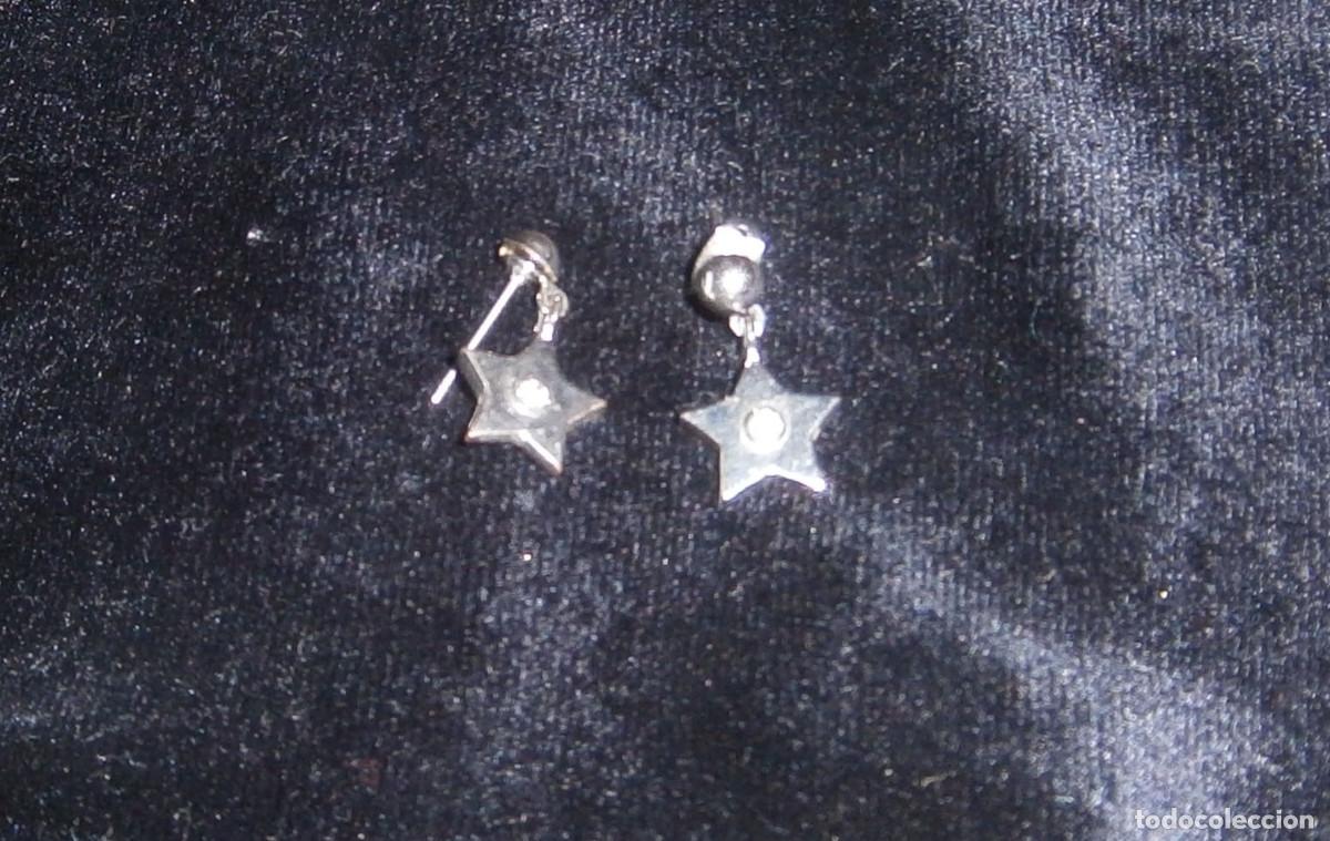 Joaillerie: pendientes de metal forma de estrella