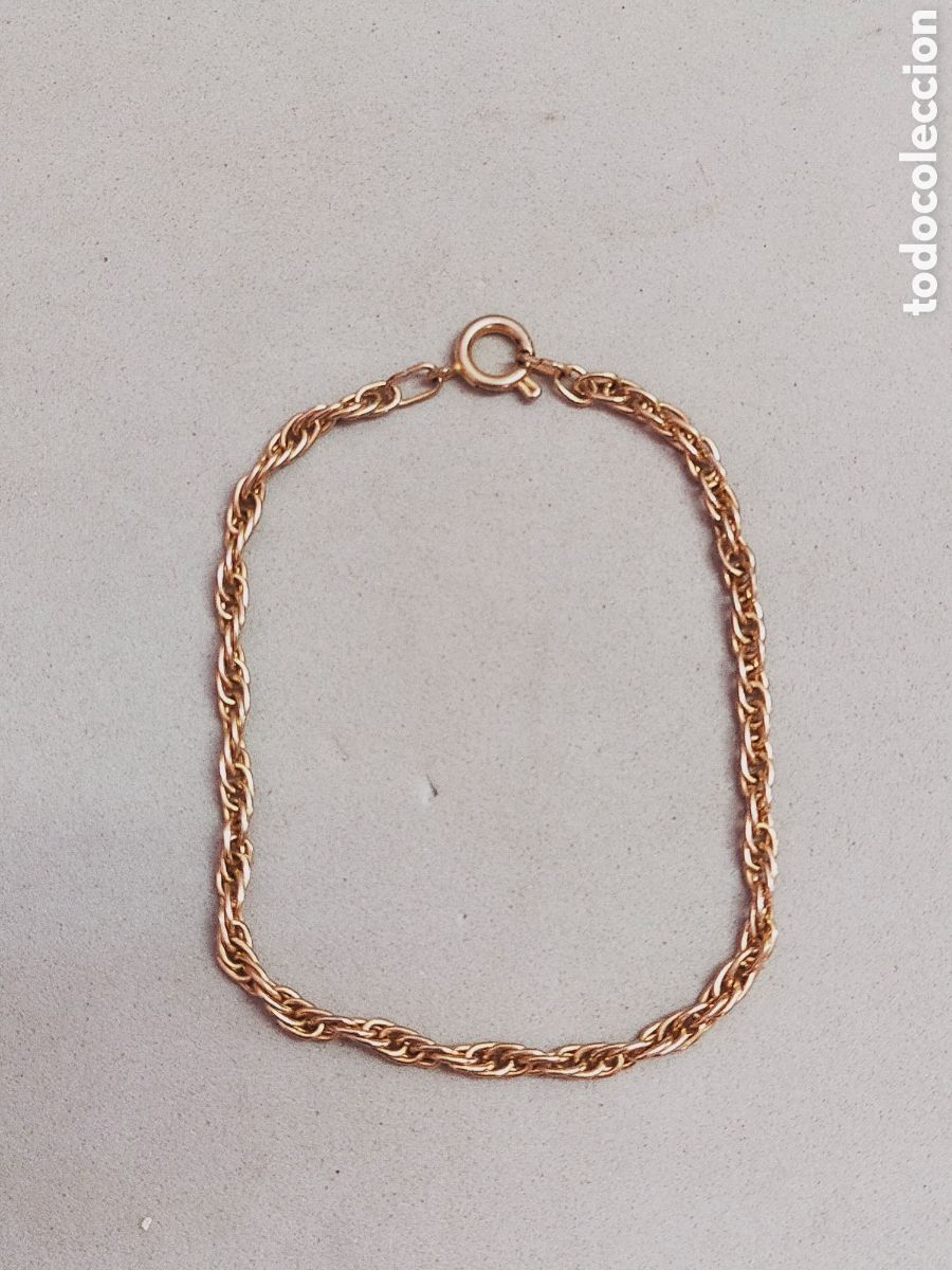 Joyeria: PULSERA EN METAL DORADO TIPO CORDON.