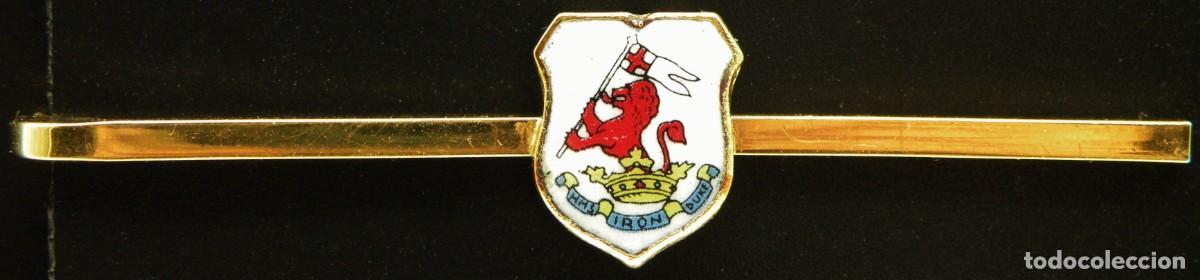 Joaillerie: PISACORBATAS / SUJETA CORBATAS INGL&Eacute;S CON ESCUDO