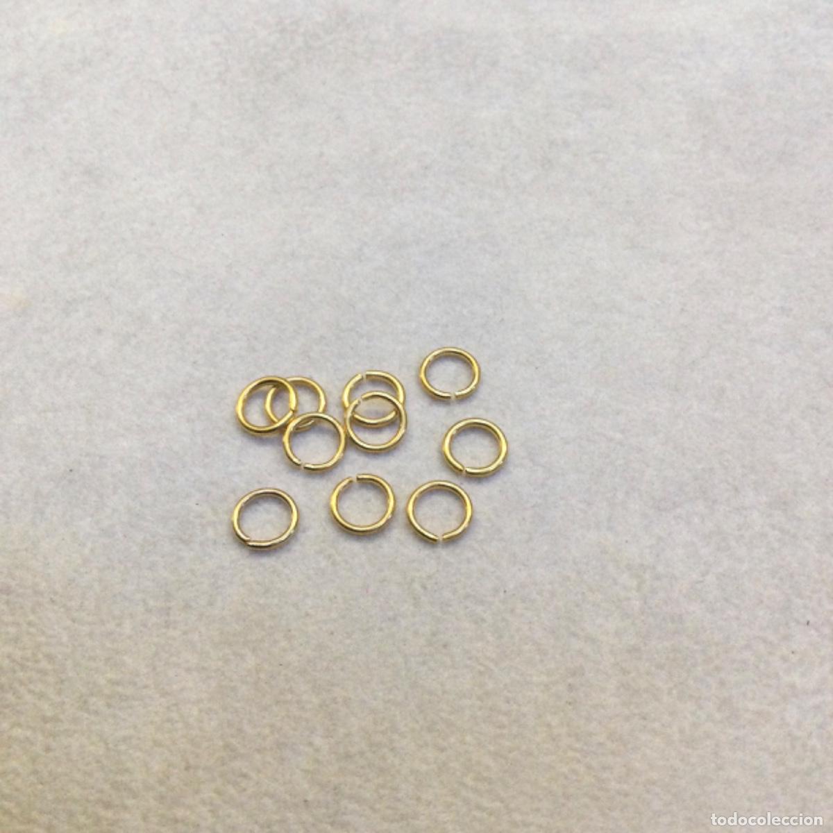 Joyeria: Fornituras. Arillos met&aacute;licos dorados. 8 mm &Oslash;.Lote de 10