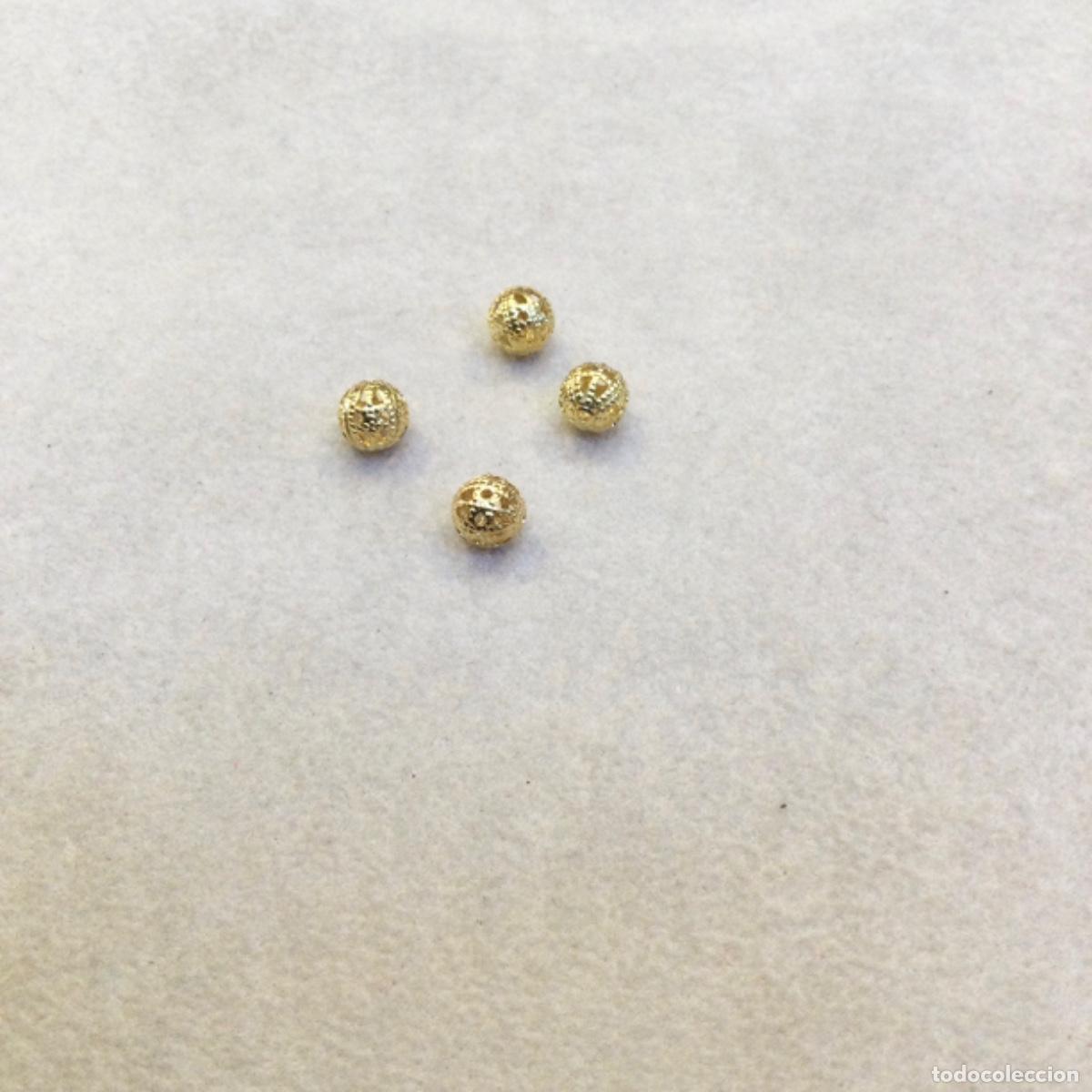 Joyeria: Fornituras. Bolitas met&aacute;licas labradas &Oslash; 6 mm. Lote de 4