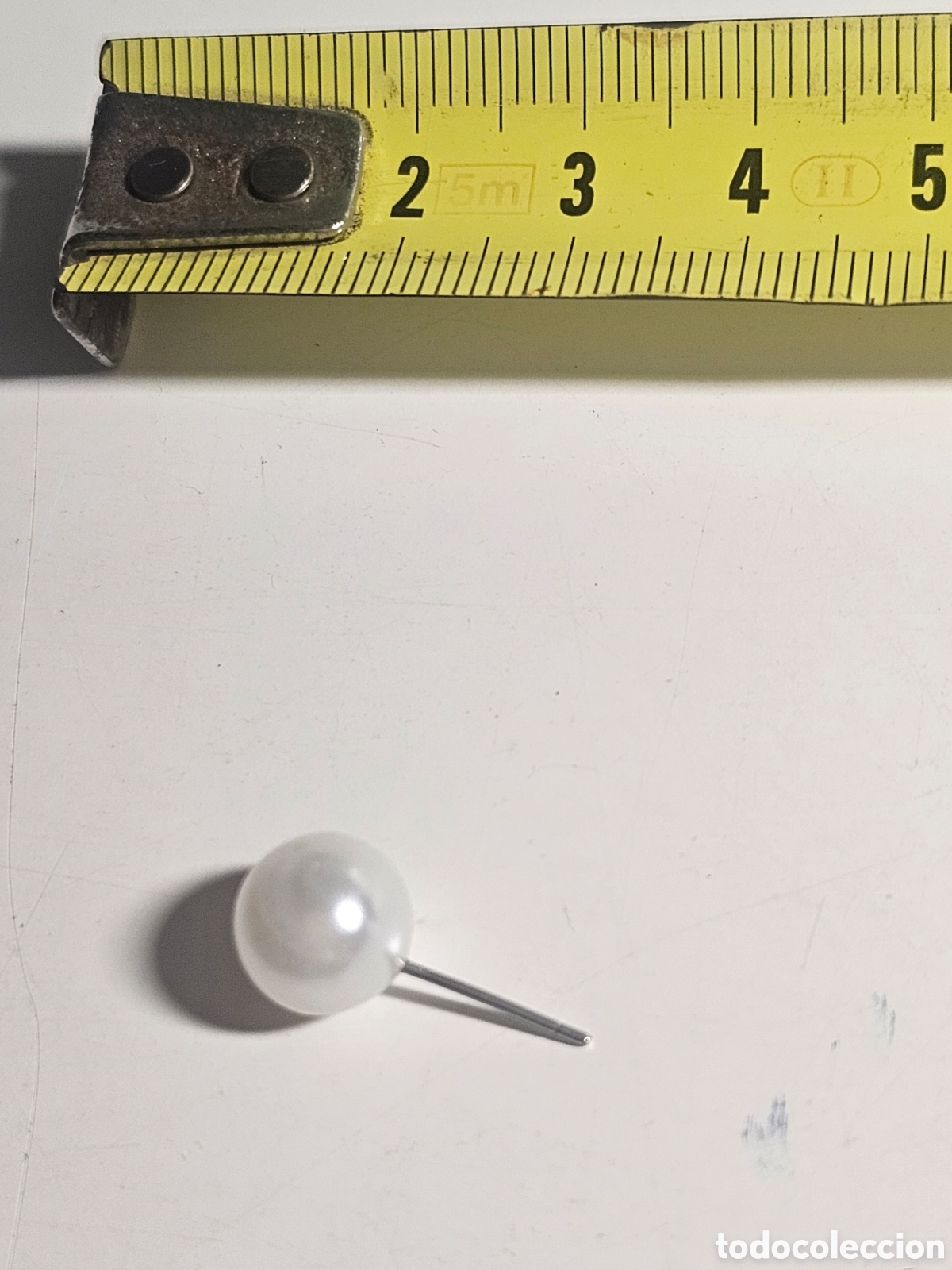 Joyeria: Parte de pendiente sin cierre, perla artificial pl&aacute;stico probablemente - Foto 3